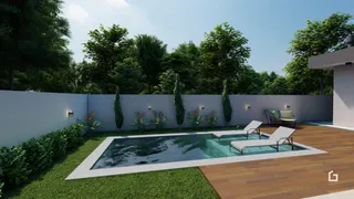 Vista da fachada de uma residência com piscina e jardim.