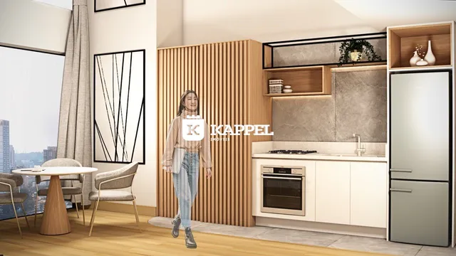 Ambiente moderno com cozinha integrada e vista da cidade em um apartamento em Lajeado.