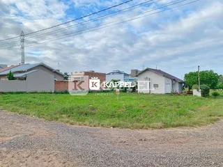 Vista externa de uma propriedade com vegetação no primeiro plano em Lajeado, Brasil.