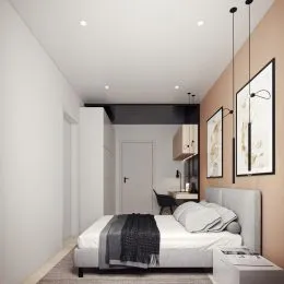 Um quarto com cama de casal e paredes brancas é mostrado na propriedade.