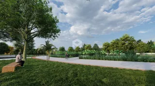 Vista de um jardim verde com caminho pavimentado em Lajeado.