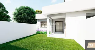Fachada moderna de uma residência branca em Lajeado com jardim verde.