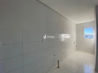 Foto de um corredor interno de um imóvel em Lajeado, Brasil.