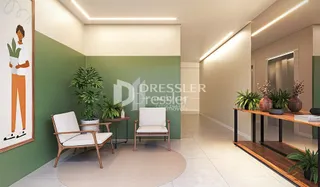 Sala de estar com paredes verdes e piso claro.
