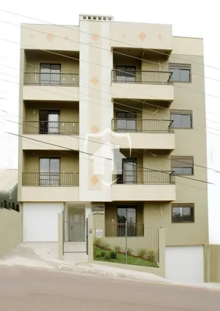 Fachada de um prédio residencial em Lajeado, Brasil, com varandas.