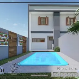 Foto da fachada de uma casa com piscina em Lajeado, Brasil.