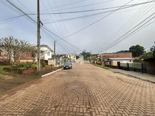 Vista da rua em Lajeado, Brasil com casas residenciais.
