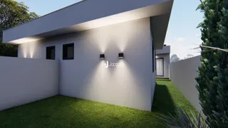 Fachada moderna de uma residência em Lajeado com jardim.