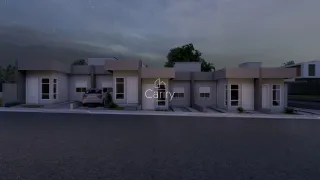 Fachada moderna de uma residência em Lajeado, Brasil, com paisagismo frontal.