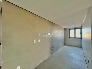 Vista interna de um corredor de imóvel em Lajeado.