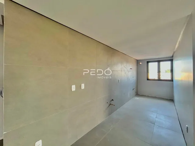 Vista interna de um corredor de imóvel em Lajeado.