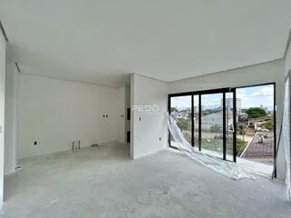 Vista interna de um espaço vazio de uma residência em Lajeado.