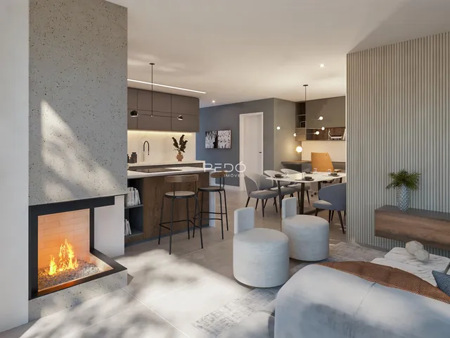 Sala de estar moderna com lareira e área de jantar em um apartamento.