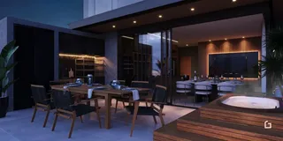Vista de uma área de lazer com jacuzzi ao ar livre em uma residência.