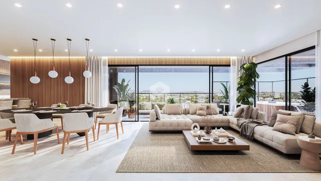 Sala de estar e jantar moderna com grandes janelas que dão vista para o exterior.