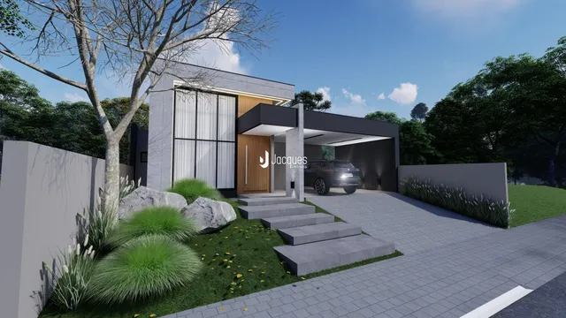Fachada moderna de uma residência com garagem e jardim em Lajeado, Brasil.