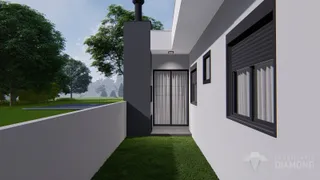 Fachada de uma residência com jardim em Lajeado.