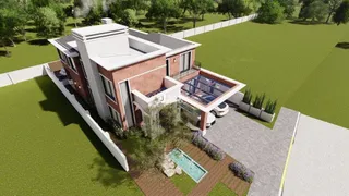 Vista externa de uma residência moderna com jardim e área de lazer.