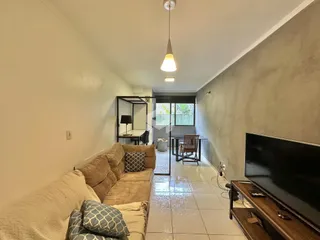 Foto da sala de estar de um imóvel em Lajeado, Brasil.