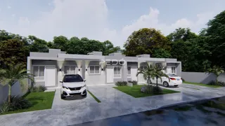 Fachada de uma casa moderna em Lajeado, Brasil, com jardim e entrada pavimentada.