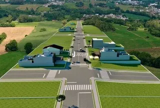 Vista aérea de um terreno com edificações e áreas verdes em Lajeado.