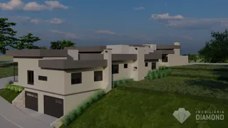 Fachada de um edifício residencial em Lajeado, Brasil, com jardim ao redor.