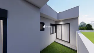 Fachada moderna de uma residência em Lajeado, Brasil, com jardim gramado.