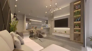 Ambiente moderno de sala de estar e cozinha em um imóvel.