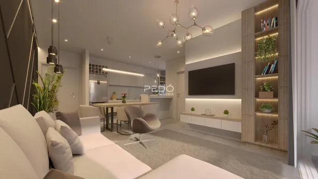 Ambiente moderno de sala de estar e cozinha em um imóvel.