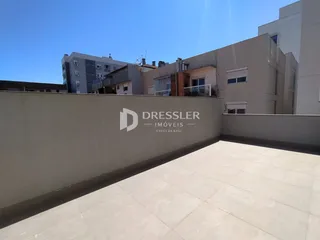 Vista externa de um imóvel em Lajeado, Brasil, mostrando uma área pavimentada.