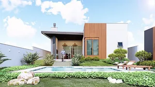 Fachada moderna de uma residência com piscina e jardim em Lajeado, Brasil.