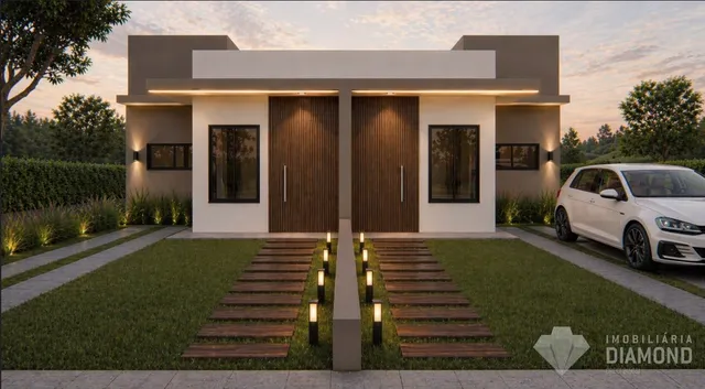 Fachada moderna de uma residência em Lajeado, Brasil com jardim e entrada.