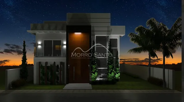 Fachada de uma residência moderna em Lajeado vista ao anoitecer.