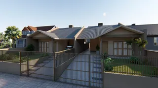 Fachada de uma casa em Lajeado com cerca e jardim.