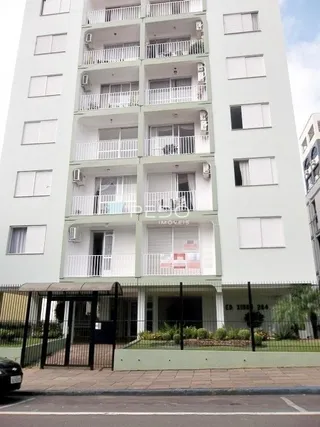 Fachada de um prédio residencial em Lajeado, Brasil com vários terraços.