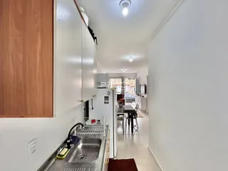 Vista de um corredor interno de uma residência em Lajeado.