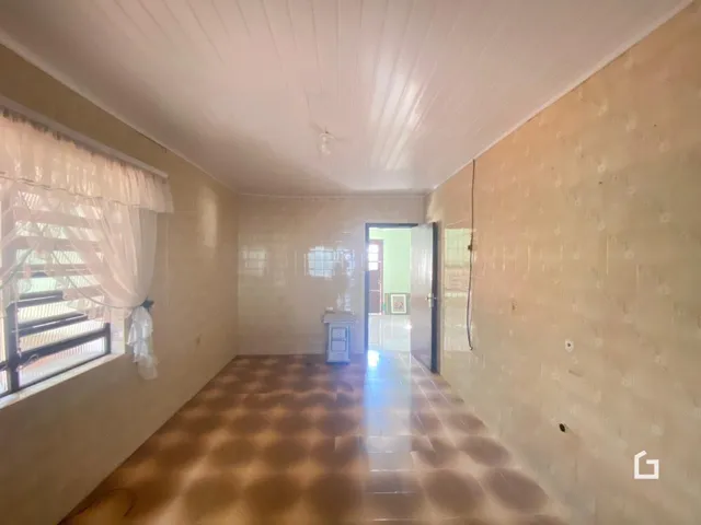 Hall de corredor interno de uma propriedade em Lajeado.