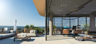 Vista moderna de uma área de estar com vista para a paisagem externa.