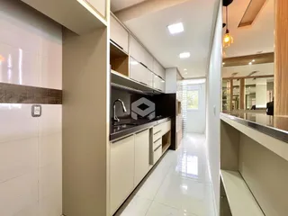 Vista da cozinha e corredor de uma propriedade em Lajeado, Brasil.