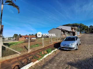 Vista externa de uma propriedade em uma rua no Brasil.