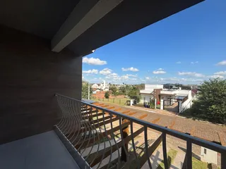Vista da varanda com vista para uma área residencial em Lajeado.