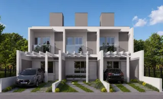 Fachada moderna de uma casa em Lajeado, Brasil, com jardim frontal e garagem.