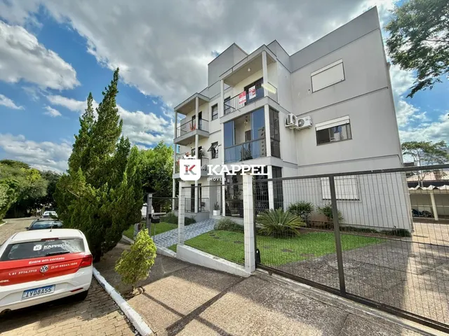 Fachada de um prédio residencial moderno com varandas em Lajeado, Brasil.