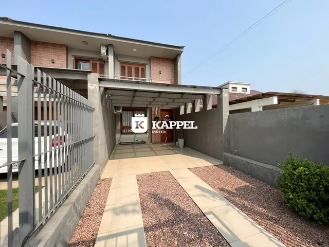 Foto da fachada de um imóvel residencial em Lajeado, Brasil, mostrando a entrada coberta.