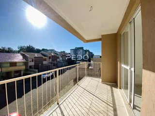 Vista da varanda de um imóvel em Lajeado, Brasil, com vista para outras residências.