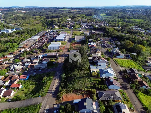 Vista aérea de uma área residencial e industrial em Lajeado, Brasil.