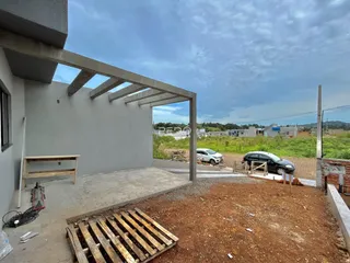 Vista externa de uma construção em Lajeado, Brasil com estrutura de concreto.