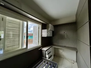 Vista interna de uma área com janela em uma propriedade em Lajeado.