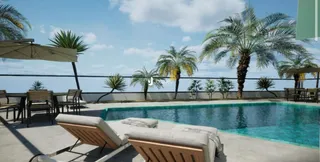 Vista de uma piscina e área externa com palmeiras em Lajeado, Brasil.