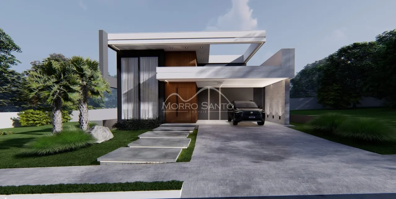 Fachada moderna de uma residência em Lajeado, Brasil, com paisagismo.
